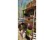 Charming wooden farm stand with decorative flowers and rustic signage for fresh produce at 368 Northwood Dr, Troy, NC 27371