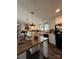 Bright eat-in kitchen with white cabinets, stylish island, and modern appliances at 368 Northwood Dr, Troy, NC 27371