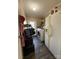 Functional laundry room with appliances, storage, and access to the outside at 368 Northwood Dr, Troy, NC 27371