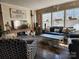 Comfortable living room includes plush seating, a modern tv, and lots of natural light at 368 Northwood Dr, Troy, NC 27371