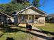 Charming one-story home with a welcoming front porch and traditional design at 411 Weathers St, Shelby, NC 28150