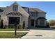 Beautiful brick home featuring a manicured lawn, black window trim and black awning detail over the front window at 4155 Persimmon Rd, Lancaster, SC 29720