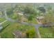 Aerial view of a neighborhood featuring well-maintained lawns, mature trees, and single-Gathering homes with pools at 417 Donna Ave, Gastonia, NC 28052