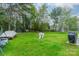 Over-sized backyard featuring green grass, storage shed and plenty of space at 417 Donna Ave, Gastonia, NC 28052