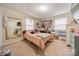 Bright bedroom with a large mirror, comfortable bed, and decorative wall art at 417 Donna Ave, Gastonia, NC 28052