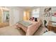 Bright bedroom features a plush bed, neutral carpet, and natural light at 417 Donna Ave, Gastonia, NC 28052