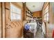 Functional laundry room with washer, dryer, storage shelves, and natural light at 417 Donna Ave, Gastonia, NC 28052