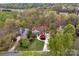 Stunning aerial view of luxury homes surrounded by lush greenery and landscaping at 4300 Old Course Dr, Charlotte, NC 28277