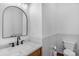 Powder room with a modern sink and fixtures, and classic wainscoting at 4300 Old Course Dr, Charlotte, NC 28277