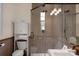 Bathroom featuring a tiled shower with glass door and a white vanity at 4300 Old Course Dr, Charlotte, NC 28277