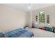 Bedroom with large window views and carpet floors, offering natural light at 4300 Old Course Dr, Charlotte, NC 28277