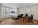 Well-lit exercise room with wood floors and large windows at 4300 Old Course Dr, Charlotte, NC 28277