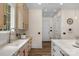 Kitchen with stone countertops, modern appliances and hardwood floors at 4300 Old Course Dr, Charlotte, NC 28277