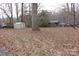Large backyard featuring a shed and trees, ideal for outdoor activities and potential landscaping projects at 508 S Jackson Ave, Waxhaw, NC 28173