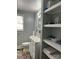 Bathroom featuring a vanity with ample storage, a neutral color palette and a window at 508 S Jackson Ave, Waxhaw, NC 28173