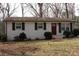 Charming single-story home with painted brick exterior and classic shutters, perfect for comfortable living at 508 S Jackson Ave, Waxhaw, NC 28173