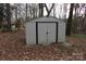 Metal shed with a double-door in backyard, suitable for storage of lawn equipment at 508 S Jackson Ave, Waxhaw, NC 28173