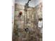 Nicely tiled shower with a rainfall shower head and built-in storage, showcasing modern design and functionality at 508 S Jackson Ave, Waxhaw, NC 28173
