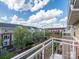 Balcony view overlooking landscaped community and surrounding neighborhood at 535 Donatello Ave, Charlotte, NC 28205
