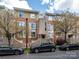 Attractive condo building featuring brick facade, balconies, and well-maintained landscaping at 535 Donatello Ave, Charlotte, NC 28205