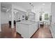 Spacious kitchen with an island, stainless appliances, and an open layout connecting to the dining and living areas at 6020 Union Pacific Ave, Charlotte, NC 28210