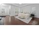 Spacious main bedroom with large windows, a comfortable bed, and ample space for relaxation and personalization at 6020 Union Pacific Ave, Charlotte, NC 28210