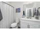 Full bathroom featuring a shower and tub with a decorative shower curtain at 631 W Tremont Ave, Charlotte, NC 28203