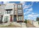 Exterior of modern townhomes with stepped entrances, varied textures, and contemporary architectural elements at 631 W Tremont Ave, Charlotte, NC 28203