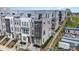 Modern townhome exteriors showcase varied textures, individual entrances, and elevated roof decks at 631 W Tremont Ave, Charlotte, NC 28203