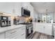 Well-equipped kitchen with stainless steel appliances, quartz countertops, and ample cabinet space at 631 W Tremont Ave, Charlotte, NC 28203