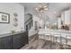 Open-concept kitchen with an island that offers bar seating and a view of the living area at 631 W Tremont Ave, Charlotte, NC 28203