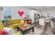 Open-concept living room flows seamlessly into the kitchen, creating a welcoming and spacious atmosphere at 631 W Tremont Ave, Charlotte, NC 28203