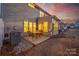 Outdoor patio with table and chairs, offering a relaxing space at 6619 Portland Rose Ln, Charlotte, NC 28210