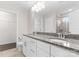 Bathroom featuring double vanity, granite countertops, and tile floors at 6619 Portland Rose Ln, Charlotte, NC 28210