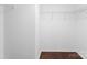 Walk-in closet with wood floors and wire shelving at 6619 Portland Rose Ln, Charlotte, NC 28210