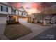 Attractive townhome with a well-kept lawn and attached garage at 6619 Portland Rose Ln, Charlotte, NC 28210