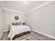 Simple bedroom with carpet, neutral walls and a comfortable bed at 704 Fresia Dr, Tega Cay, SC 29708
