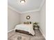 Cozy bedroom featuring soft carpet, a decorative rug, and natural light at 704 Fresia Dr, Tega Cay, SC 29708