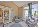 Cozy screened patio offers outdoor seating, light and privacy at 704 Fresia Dr, Tega Cay, SC 29708
