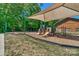 Community playground with swings, slides, and a sandbox provides a fun and safe area for to play at 704 Fresia Dr, Tega Cay, SC 29708
