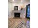 Cozy fireplace with decorative mantel, modern flooring, and a stylish room design at 715 21St Ne Ave, Hickory, NC 28601