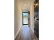 Inviting hallway featuring modern floors and a view of the outdoors from the front door at 715 21St Ne Ave, Hickory, NC 28601