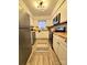 Bright kitchen with white cabinets, butcher block countertops, and stainless steel appliances at 715 21St Ne Ave, Hickory, NC 28601