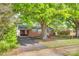 Charming brick home with mature trees and a well-maintained front yard at 764 Emorywood Ln, Rock Hill, SC 29730