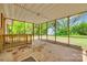 The screened-in porch offers views of the backyard and includes a ceiling at 764 Emorywood Ln, Rock Hill, SC 29730