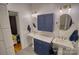 Elegant bathroom featuring double sinks and blue vanity at 803 Catawba St, Belmont, NC 28012