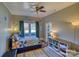 Cozy bedroom with decorative ceiling and hardwood floors at 803 Catawba St, Belmont, NC 28012