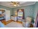 Cozy Bedroom with a rocker, changing table and a view from the window at 803 Catawba St, Belmont, NC 28012