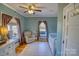 Charming bedroom with natural light and neutral walls at 803 Catawba St, Belmont, NC 28012