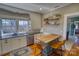 Bright kitchen with white cabinets, butcher block island, stainless steel appliances, and natural light at 803 Catawba St, Belmont, NC 28012